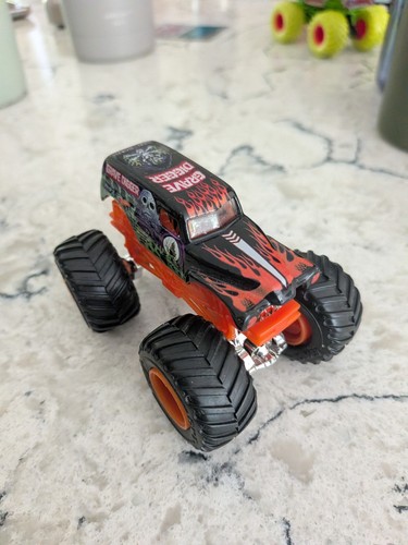 Orange grave digger monster