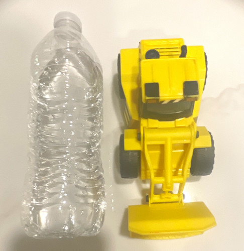 Yellow black plastic toy - yellow,